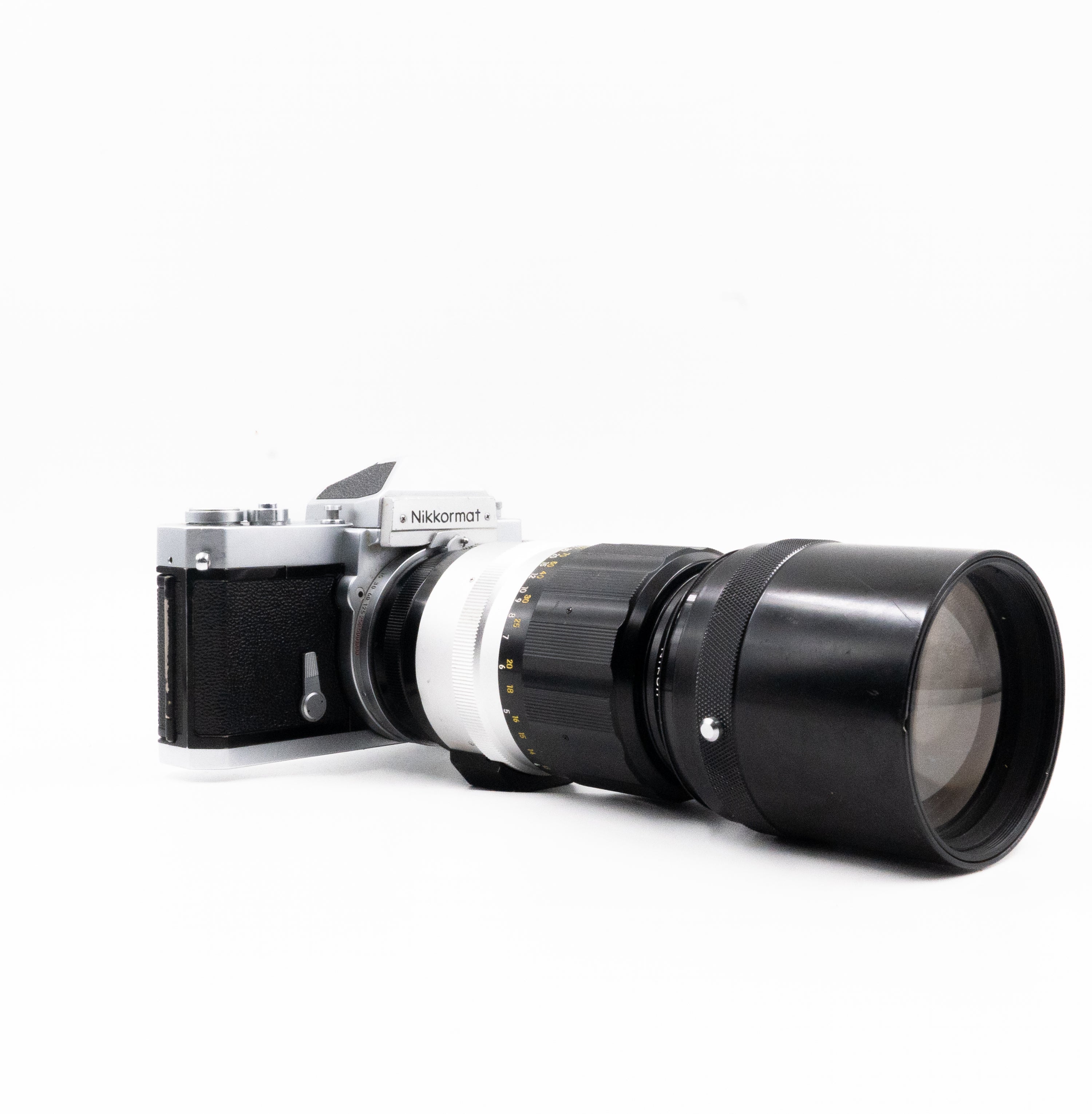 Nikkormat + 300mm lens