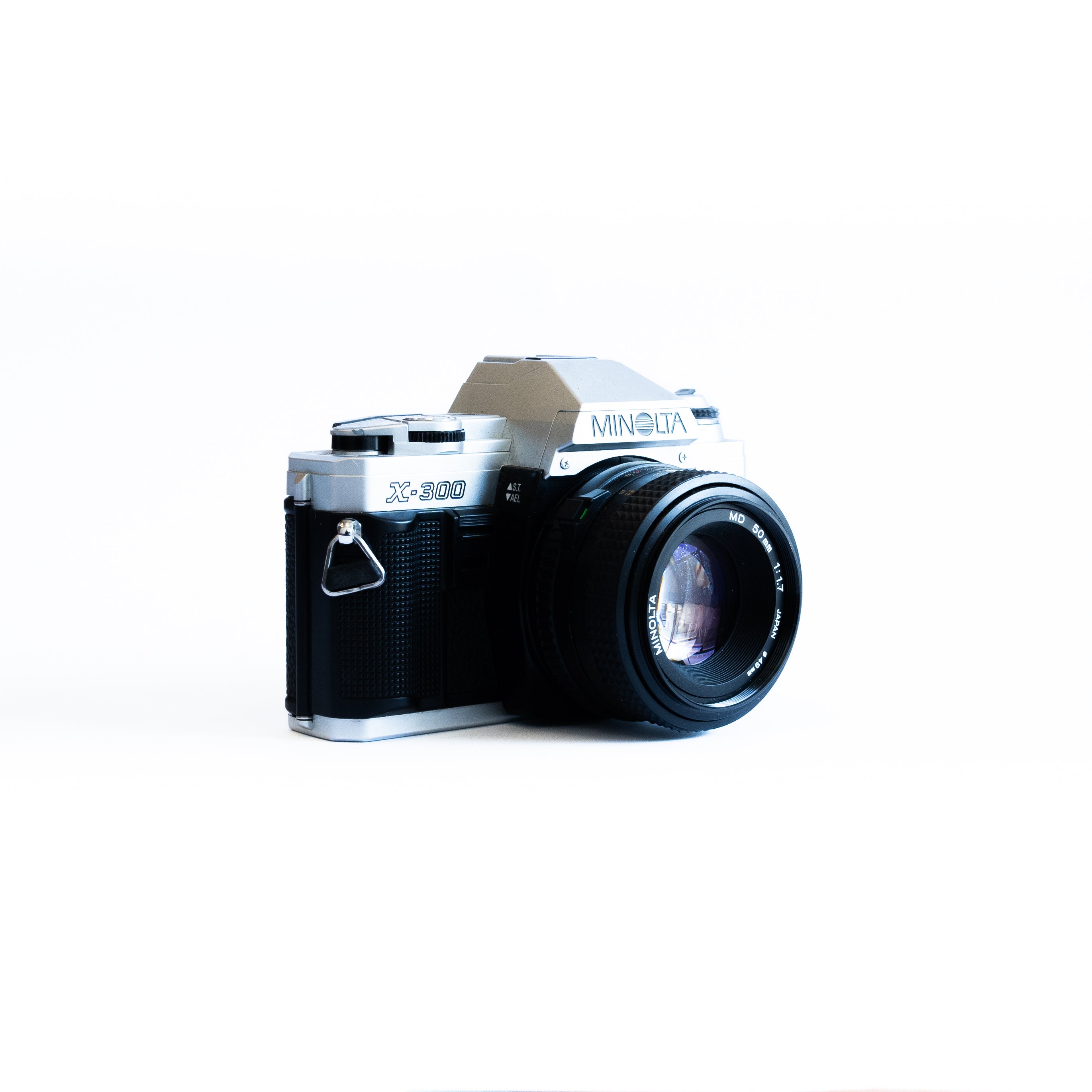 Minolta x300 + 50mm F1.7 lens