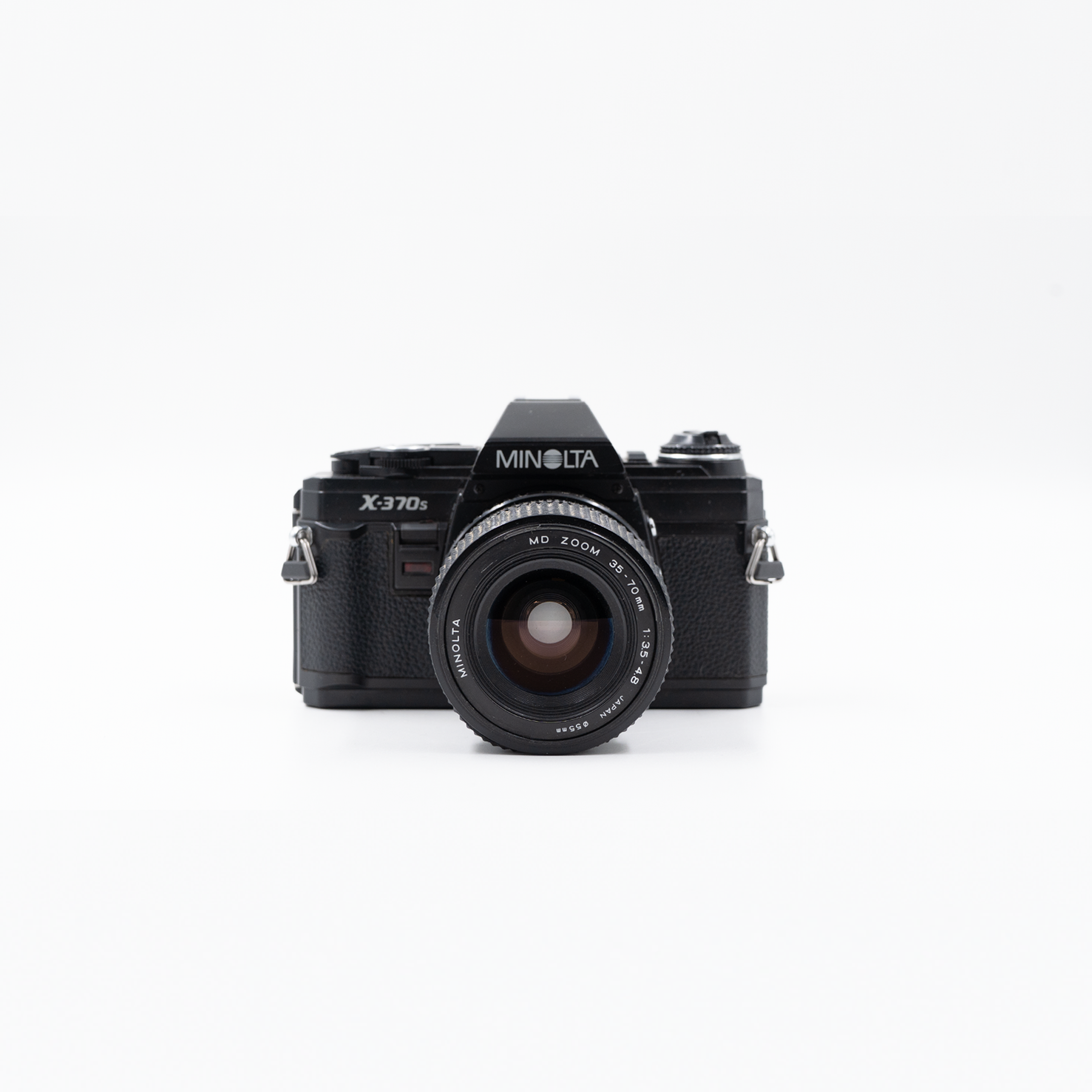 MINOLTA X-370S + 35-70MM F 3.5-4.8
